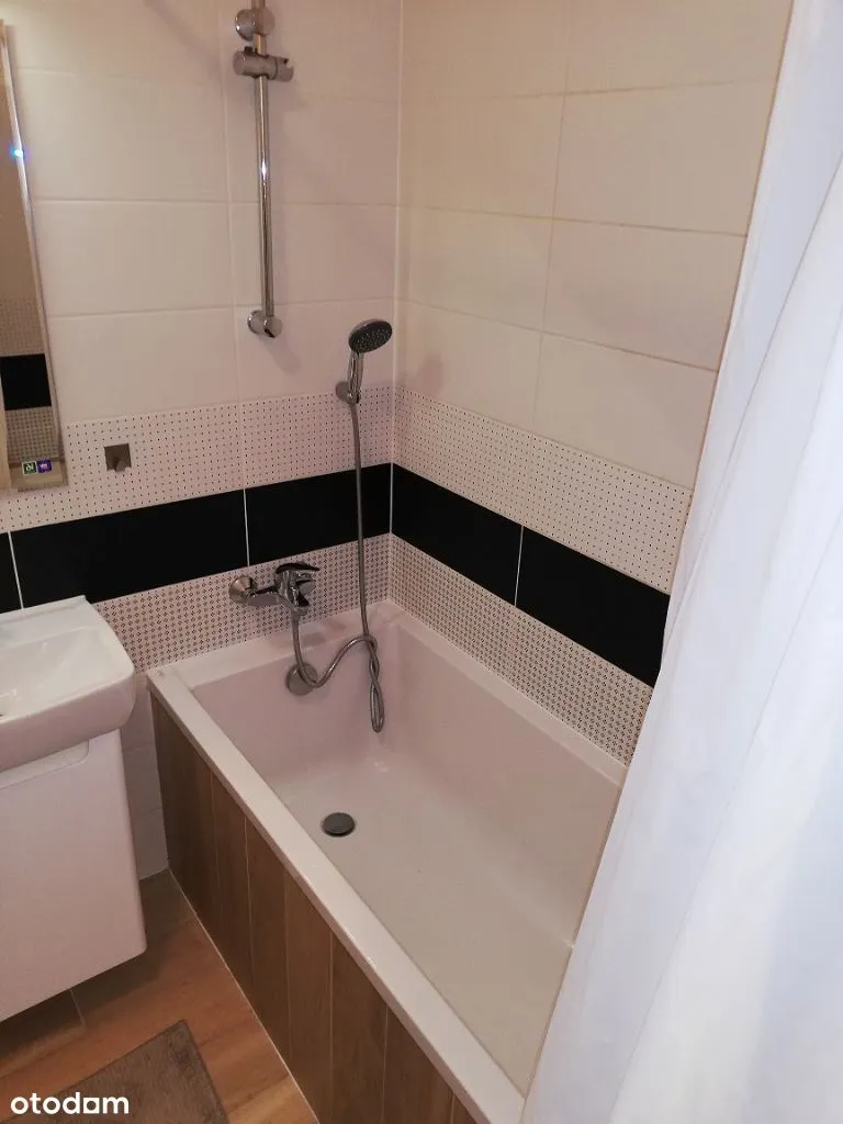 2 pokojowy apartament, miejsce postojowe, ochrona