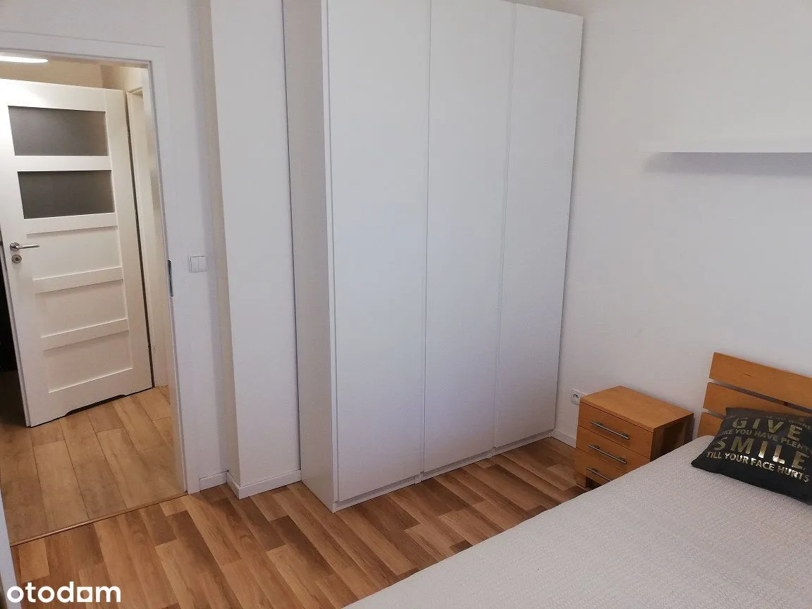 2 pokojowy apartament, miejsce postojowe, ochrona