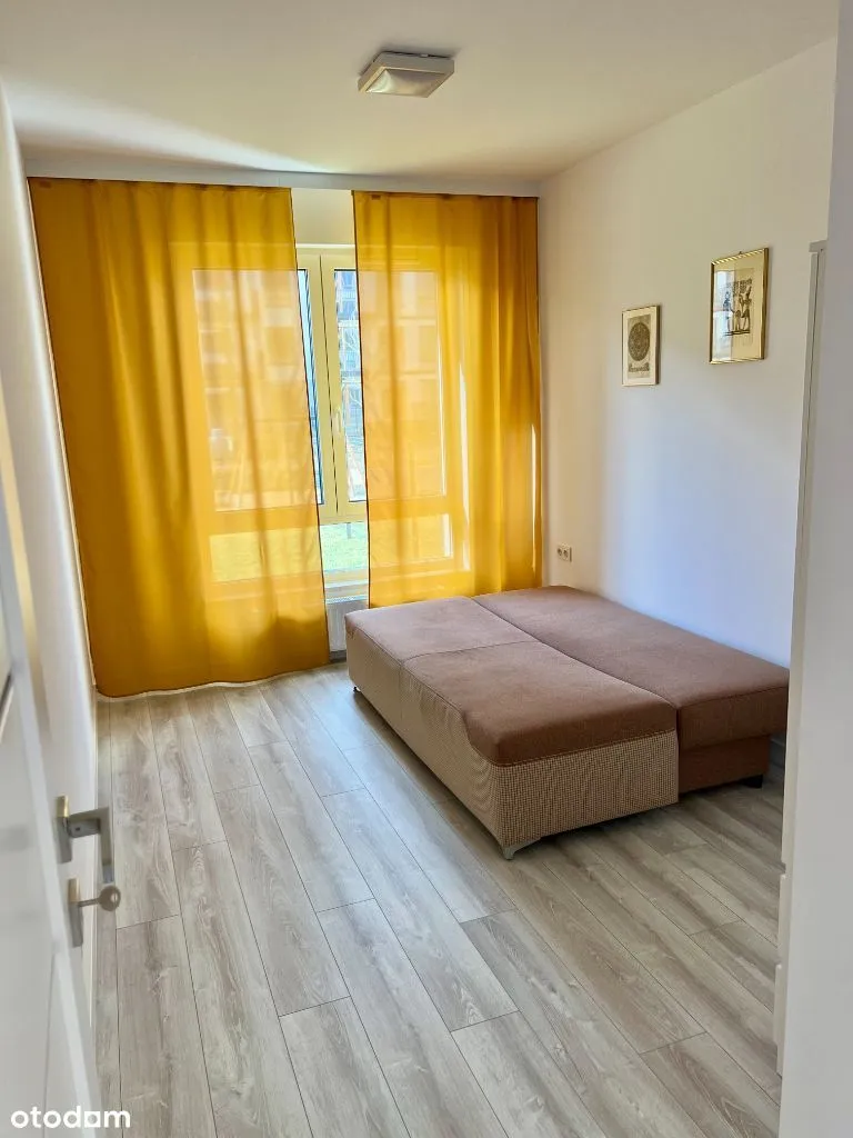 Apartament 54 m² z dwoma garażami i ogrodem 120m2