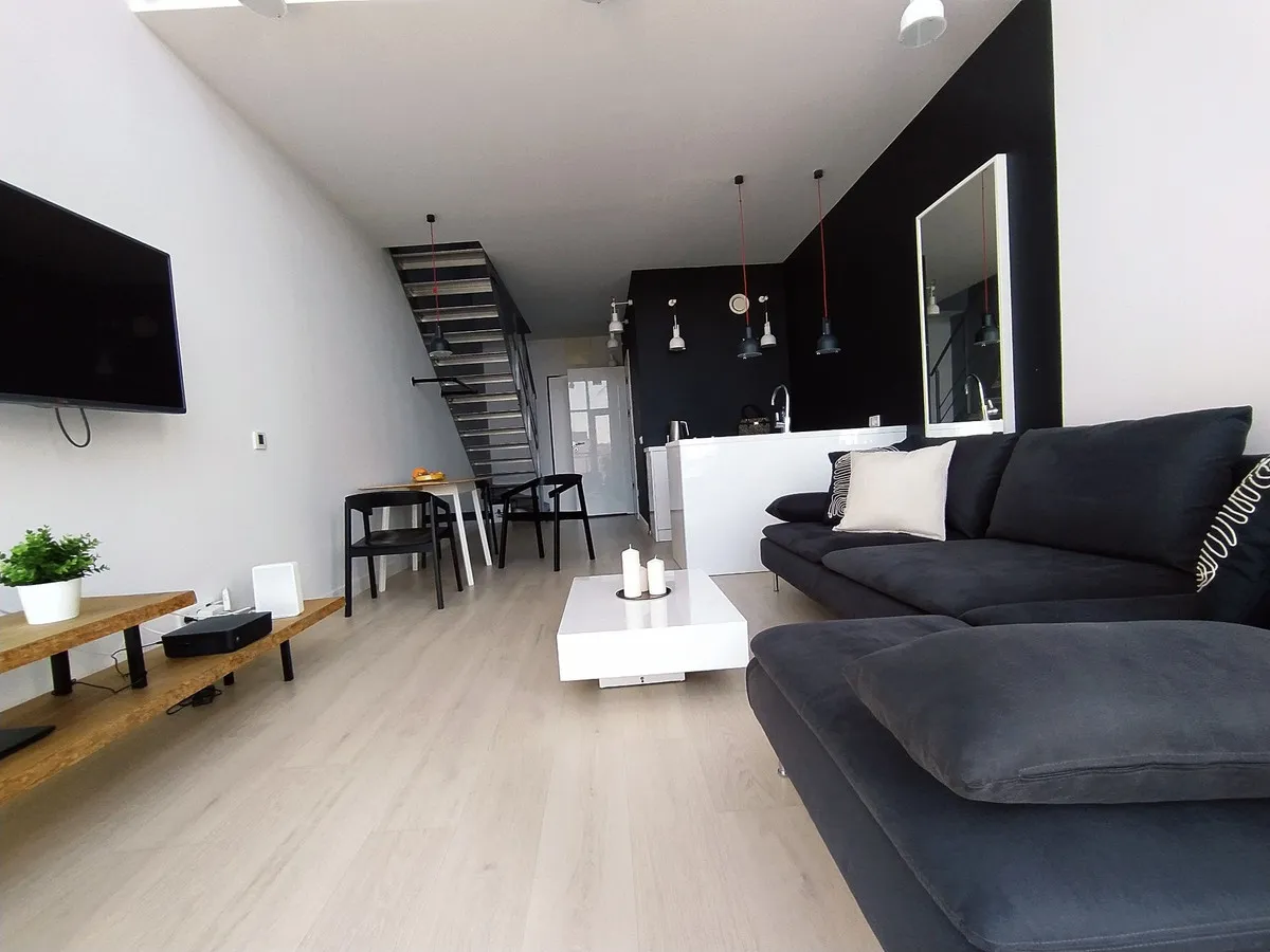 Dwupoziomowy apartament w sercu Mokotowa 