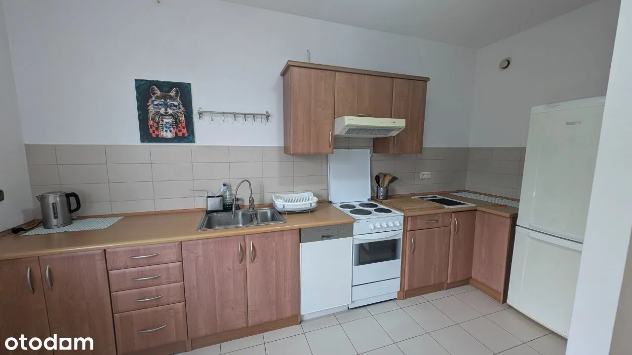 Jednopokojowe z tarasem w apartamentowcu + garaż