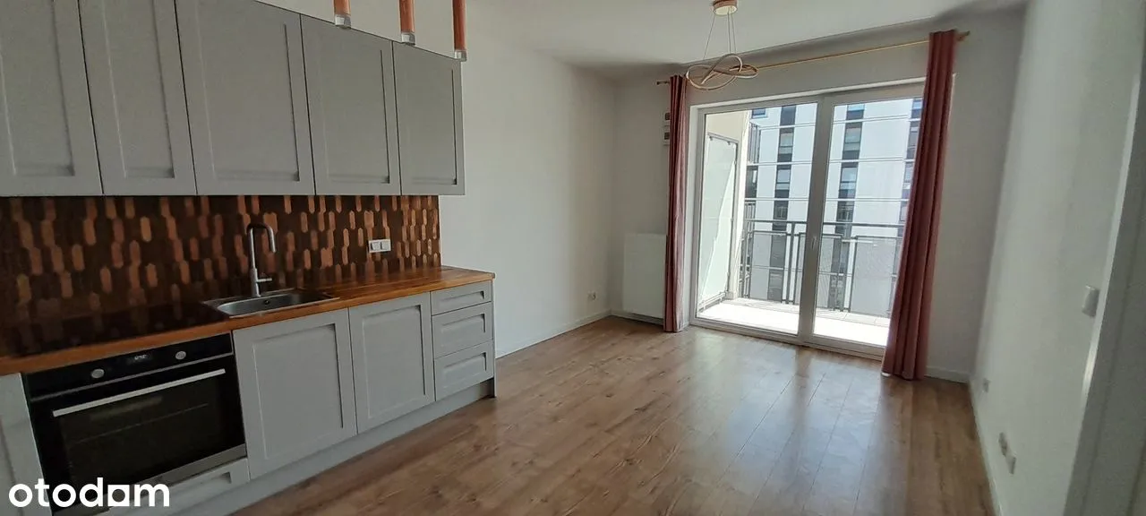 2 pokoje, miejsce postojowe + komórka, duży balkon