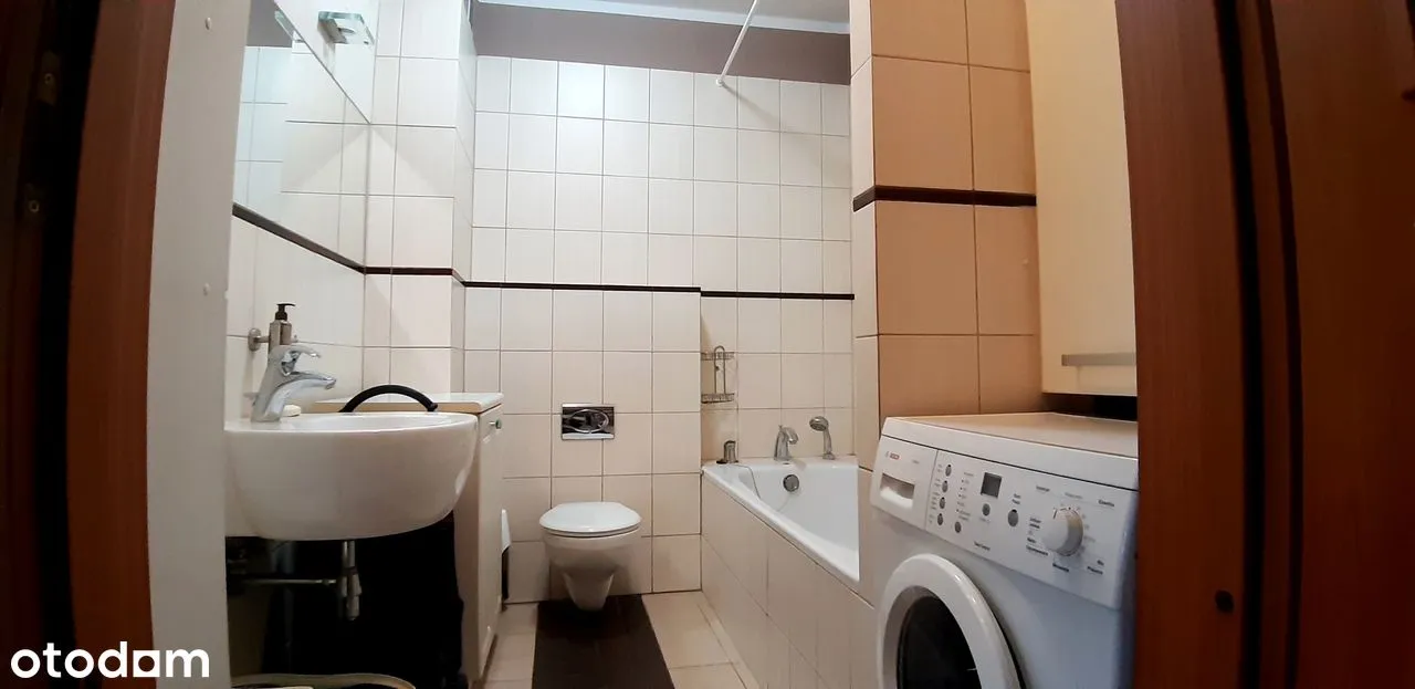 Parter duży balkon z miejscem garażowym