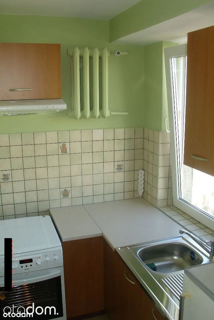 Przytulana kawalerka z widną kuchnią i balkonem