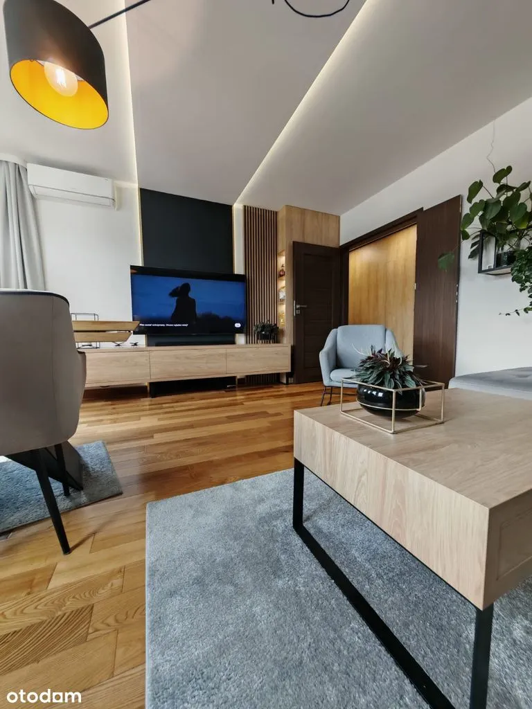 Nowoczesny apartament z widokiem na Woli.